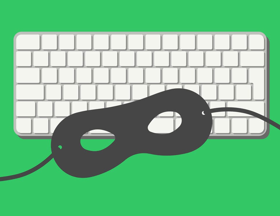 Illustration zu Cyberkriminalität. Schwarze Zorro-Maske auf einer Tastatur